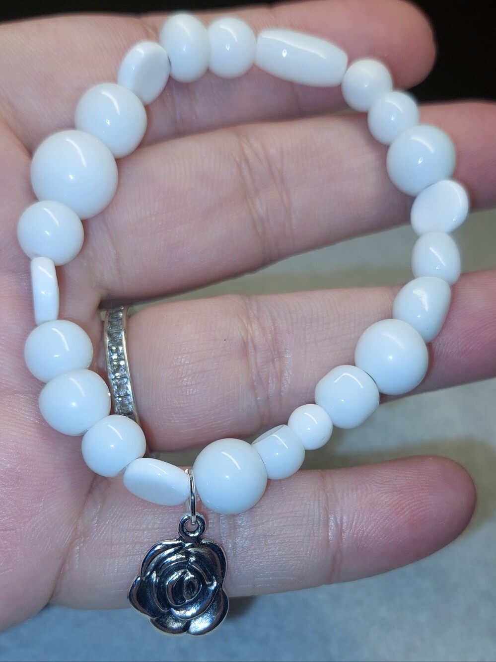 White Glass Beaded Stretch Bracelet with Silver Rose Charm